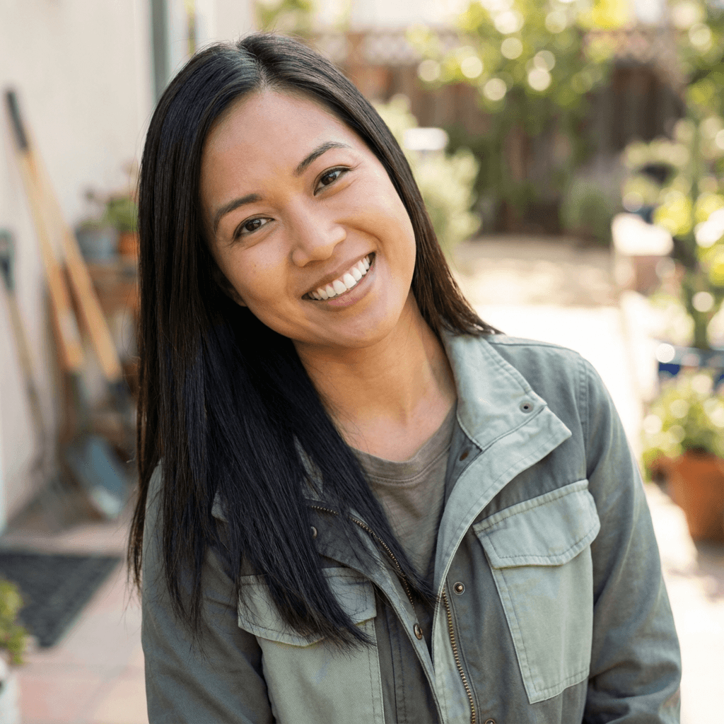 M. Chen smiling in a warm kitchen